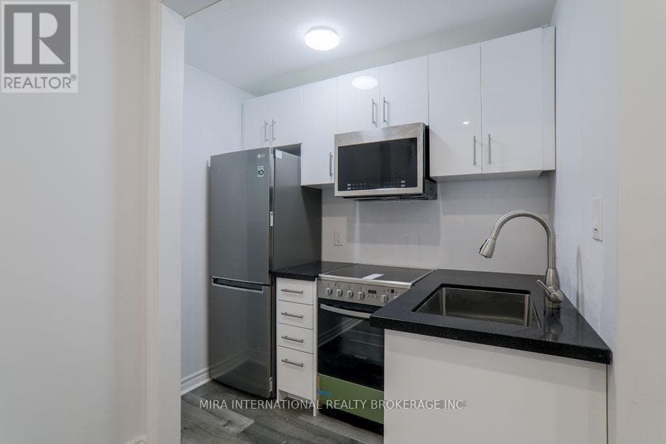102 - 210 CARLTON STREET — 1-bedroom Apartment in 210  210 CARLTON STREET, Toronto — photo 6